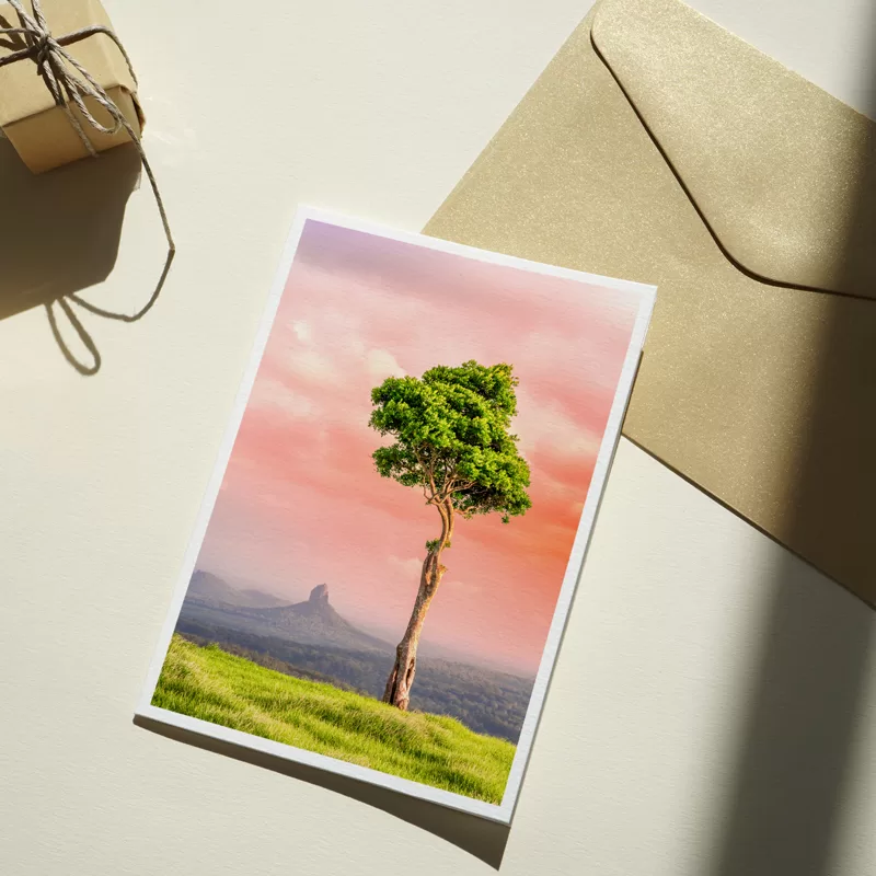One Tree Hill postcard on top of an envelope